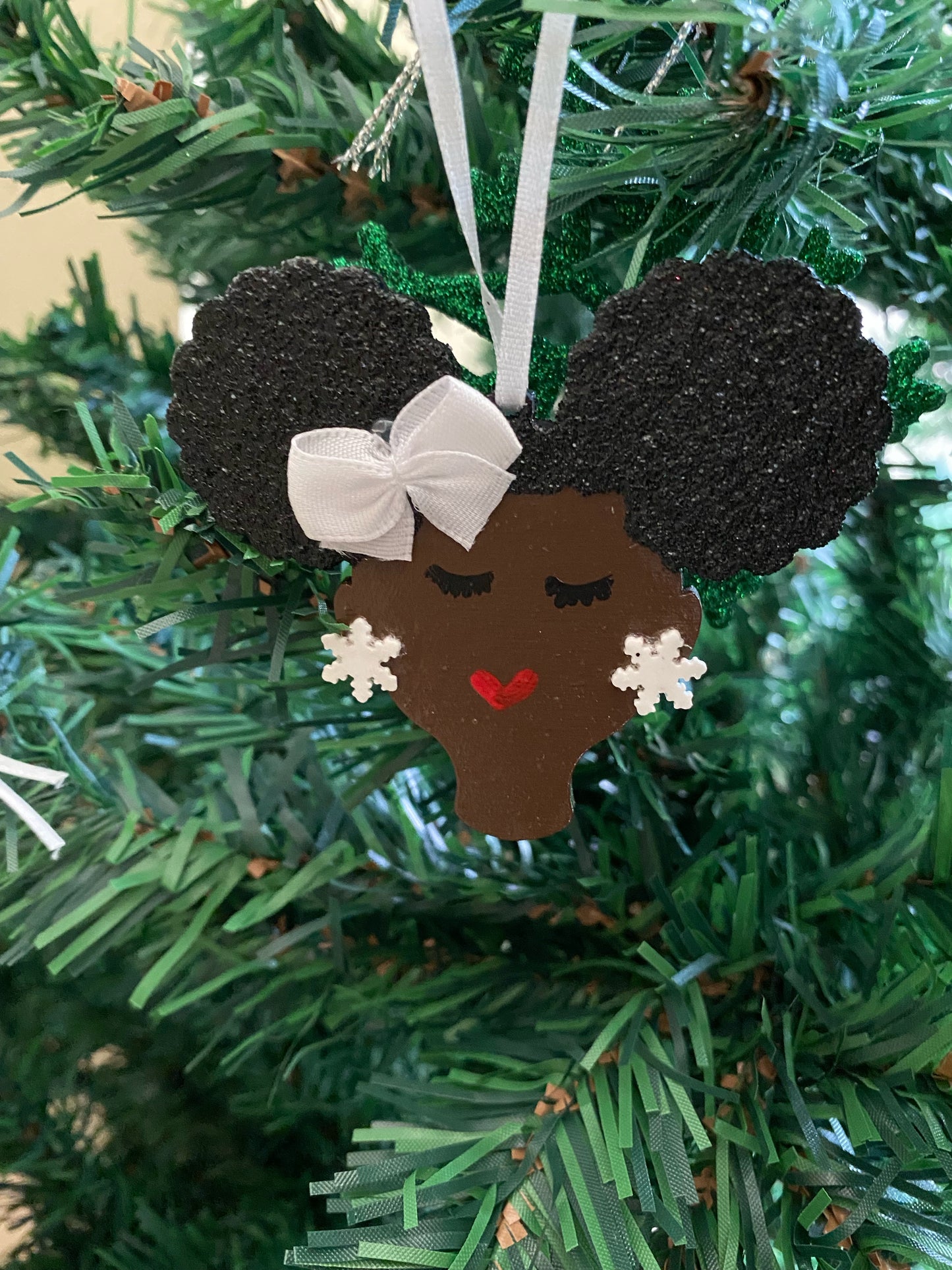 Rockin’ Around Her Afro Puffs 🎵